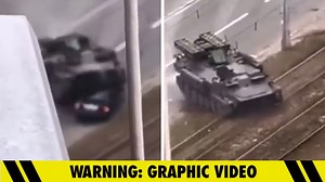 Russian Tank Rolls Over Car in Ukraine, Driver Miraculously Survives