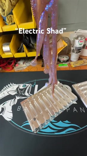 I've taken your feedback into consideration and I'm pleased to introduce my new, darker version of Electric Shad. As my unique interpretation, it may differ from other makers. This lure features LureWorks colors and glitter, paired with a 5-inch paddle tail crafted by Kearby Design & Manufacturing. Better 👍 worse👎, let's hear your thoughts. #fypageシ #fypシ #baitmaking #texasmade #fishing #fyp #electric #wednesday #smallbusiness | K&R Bait Company