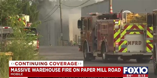 Massive warehouse fire on Paper Mill Road still burns
