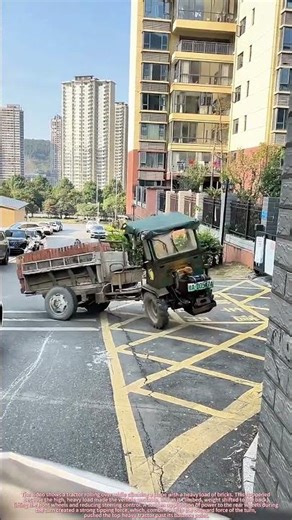 The Tractor Flipping Itself When Carrying a Load of Red Bricks Up a Slope