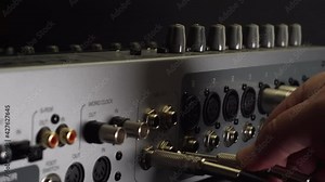 preparing sound mix panel for operation . Music record stage equipment
