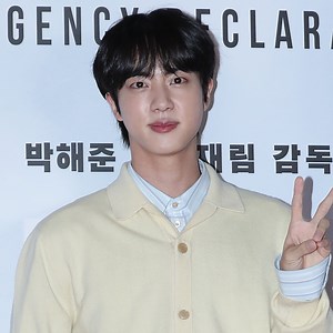 See BTS' Jin's Shaved Head as He Begins Mandatory Military Service