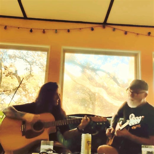 Lovely afternoon in the Florida room with two guitars, some Topo, and a phone propped up on a rocking chair to catch some moments 💜💜💜 | Messy Jessie & The Doc