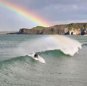 Tom Murphy surfing the rainbows in front of Dunluce Castle on the North Antrim coast. 🎥 Steve Longstaffe | Love Ballymena