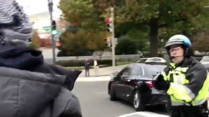 Video shows woman help homeless man in confrontation with police in D.C.