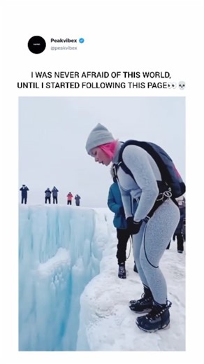 Peakvibex on Instagram: "This video shows a woman performing BASE jumping from a glacier crevasse. The video begins with her standing on the edge of a high cliff, wearing jumping gear and a parachute. A few people are standing nearby, cheering her on. The woman leaps into a deep, tight crevasse. As she falls, a large, colorful target or cloth is visible just below her. After a few seconds of falling, she releases her parachute. At the end of the video, she is seen flying high in the air with the