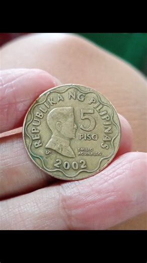 4.7K views · 50 reactions | 5 Php BSP series 2002 ( as sample error coin ). Coin's error description: An ( over-embossed error coin ) occurs when a coin's design elements, particularly the lettering or details, are excessively raised or thickened during the minting process. This is often due to a problem with the dies used to strike the coin, where too much pressure is applied or the dies are not properly aligned. | Lauro R. Cachero | Facebook