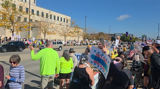Cindy and I attended what many in the GOP called the "Hate America" rally today in Cedar Rapids. For a hate rally, there sure was a lot of love in the air. Love of country, love of freedom, love of our shared history, and love for our fellow Americans. I have some lasting impressions from today... 1) The crowd was huge, bigger than I expected. The protesters lined both sides of a busy 8th Avenue, stretching for many blocks from the river bridge near the Federal Courthouse towards Mercy Hospital.