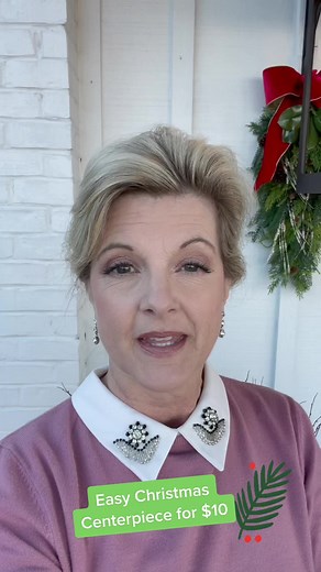 Easy $10 Christmas centerpiece. #christmas #christmascenterpiece #christmasflowers #christmastable #christmastabledecor #christmastablescape