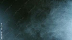 Blue smoke on black background. Cigarette smoke. Smoke effect. Fog background. Abstract smoke cloud in slow motion. Smoke in studio blue light. Smoke machine Stock Video