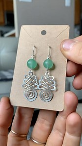 Day 2: Simple Earring Series Welcome back to day two of making 7 days of simple earrings! This earring style is similar to the first pair, however the swirls are overlapping each other instead of just going back and forth :) the plus side of these is that they look like mini Christmas trees haha! I’d love to know what you thought of these earrings :) comment down below if you prefer seeing simple earring tutorials or if you enjoy more advanced ones! Creationsthatrock.com for my work :) • • • • •