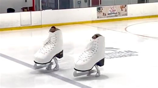 Olympic Ice Skaters Glide Around the Rink Dressed as Giant Ice Skates