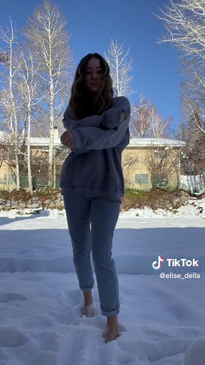 Barefoot in Snow: Embracing the Cold with a Smile