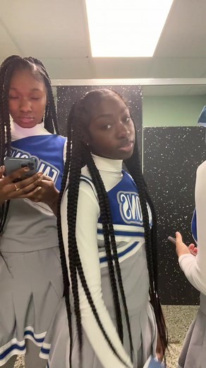 Cheerleaders Having Fun in Locker Room