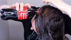 More And More People Are Rinsing Their Hair With Coca-Cola For This Interesting Reason