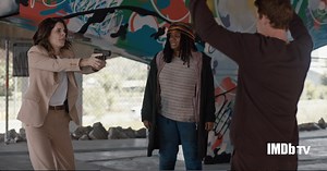 Adrienne C. Moore and Meredith MacNeill Face off at Gunpoint in 'Pretty Hard Cases' Exclusive Clip