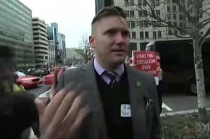 Take a Minute Out of Your Day to Watch Richard Spencer Get Punched to "Sandstorm"