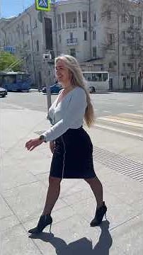 Beautiful Lady Walking Down The Streets