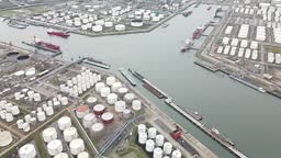 Container and silos in the Port of Rotterdam heavy industry and...