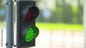 Automatic Road Barrier Gate Lifting gate opens and passes car in the background of traffic light