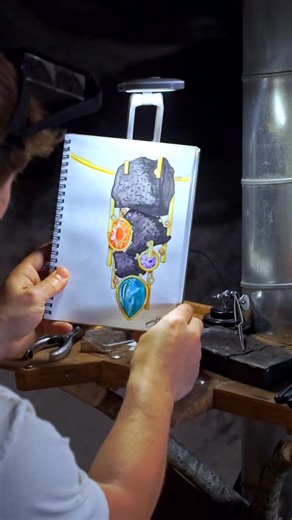 Sam Holmes Design on Instagram: "Designing a one-of-a-kind pendant inside the Luna Aura suite at @labutteauxbois . Hidden within the VIP suite is a meteorite room shaped like the surface of the moon, displaying extraordinary celestial fragments. I was incredibly lucky to have the opportunity to design and make a piece in this space, directly inspired by its atmosphere and energy. Created using meteorites and gemstones supplied by @jochenleen 8.07ct Paraiba Tourmaline 7.58ct Mandarin Garnet 0.87c