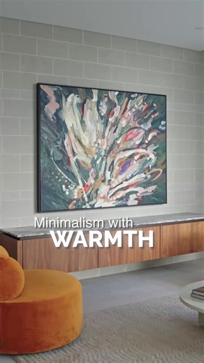 When your kitchen and living space speak the same language. We designed this living unit using the same stone and drawer fronts as the kitchen-bringing minimalism and cohesion to the entire room. Follow for more timeless interior design. ✅