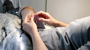 European man with Achilles tendon rupture after rupture operation self-injects enoxaparin or dalteparin in his belly subcutaneously with prefabricated syringe to avoid thrombosis myocardial infarction