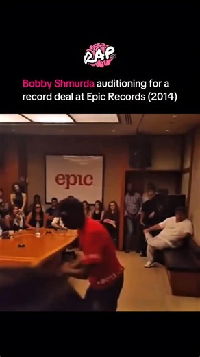 RAP | HIP-HOP Music | CULTURE on Instagram: "In 2014, Bobby Shmurda’s career took off after his breakout track “Hot N” went viral online and caught the attention of major labels. The song was officially released by Epic Records and became a commercial hit, peaking at No. 6 on the Billboard Hot 100 and later earning Platinum certification. 👀 Epic Records executives were among those who took notice of Shmurda’s energy and unique presence as the track spread, leading to a meeting at Epic’s offices