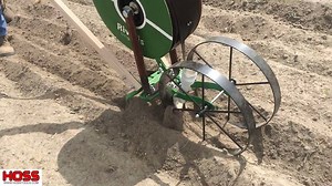 Here's the first prototype of our Drip Tape Layer attachment for the Hoss Double Wheel Hoe. This easily turns a two-man job into a one-man job by laying and covering the drip tape with one pass down the row. Stay tuned to see when we make this available on https://hosstools.com/. | Hoss