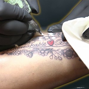 18 years in an abusive relationship left Rina with physical and mental scars - but now her tattoos tell a story of survival. | BBC Stories