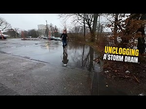 #063-1 Unclogging a storm drain during rain in Germany