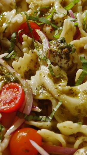 Best. Pasta. Salad. Ever! No mayo, tons of fresh basil and garlic, plus mini mozzarella and juicy summer tomatoes. It's the perfect summer meal! Recipe: https://bakerbynature.com/garlicky-tomato-basil-pasta-salad/ | Baker by Nature