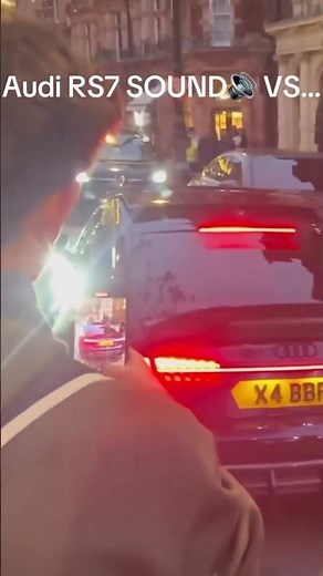 Audi rs7 vs ferrari v12