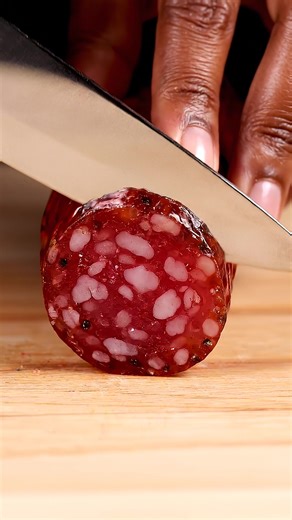 ASMR Crystal Salami Slicing 🥩💎. POV: slicing a hyper-realistic crystal glass salami in slow-mo 😱✨ Razor-sharp knife cuts through wrinkled red casing → marbled fat & peppercorns inside — rich layered glass cracks sparkling ruby & ivory shards flying everywhere 🔥 No talking, pure premium charcuterie ASMR tingles! #ASMR #tingles #slowmotion #oddlysatisfying #satisfyingvideos