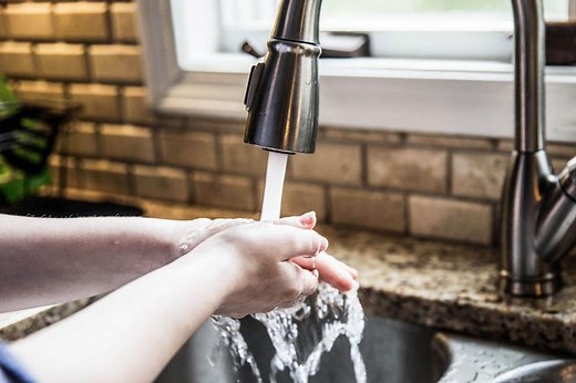 How to Clean a Faucet Head: Easy Ways to Remove Buildup | LoveToKnow