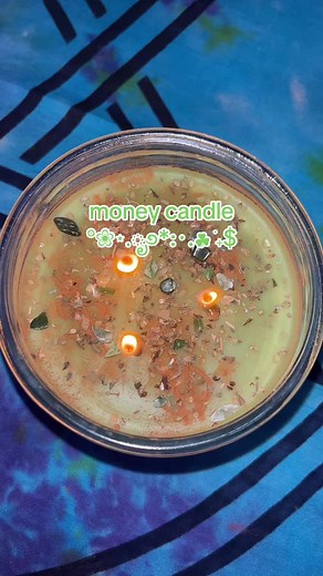 super easy money spell tutorial with herbs you probably already have! you can use any crystal that draws money if you don’t have these specific ones! and if you don’t want to put your crystals in the candle just put them to the side. i got this candle at walmart #witch #witchtok #spellwork #witchy #moneyspell #money #prosperity