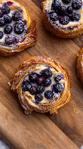LEMON & BLUEBERRY CHEESECAKE TARTS. Creating a tart base by crinkling Fillo Pastry is such an easy thing to do. These tart bases can be filled with any sweet filling, we’ve topped ours with a creamy lemon cheesecake filling and fresh blueberries. Here is the link which you can copy into your internet browser: https://antonioufillo.com.au/blog/recipes/lemon-blueberry-cheesecake-tart #cheesecake #lemoncheesecake #blueberrycheesecake | Antoniou Fillo Pastry