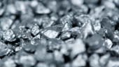 Heap of silver nuggets background as detailed seamless loopable...