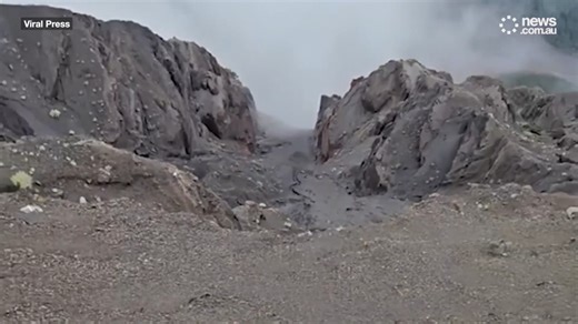Woman plunges into volcano
