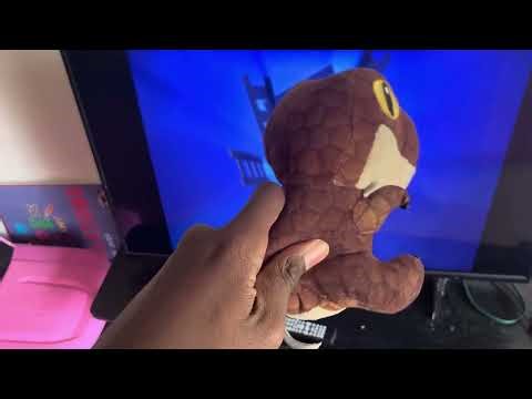 Baby velociraptor watches new line home entertainment and Infinifilm logo