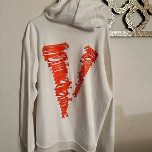 Vlone 999 Juice World white with orange lettering hoodie.