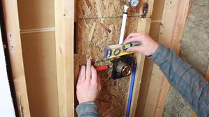 7.5K views · 83 reactions | Installing Delta Faucet rough-in valve and diverter (for handheld shwoer) with PEX...valves centered on shower drain, plumb, and level...complete video is now available inside Bathroom Repair Tutor Video Library https://bathroomrepairtutor.com/video-library/ | Home Repair Tutor | Facebook