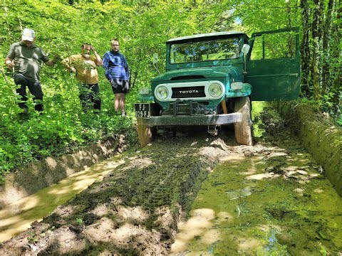 1974 Toyota FJ40 PTO winch recovery from mud