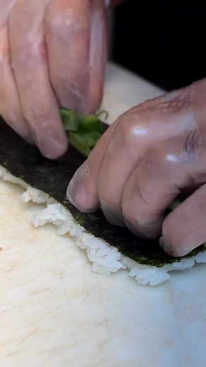 Make the Tis The Salmon with Chef Musashi 🐟 The Tis The Salmon is made with Spicy Crab, White Onion, Jalapeño, Topped with Tempura Fried Smoked Salmon, Cilantro, Teriyaki Sauce, and plated on Lucy Sauce. 🍣 | Trapper's Sushi Co. - Avondale