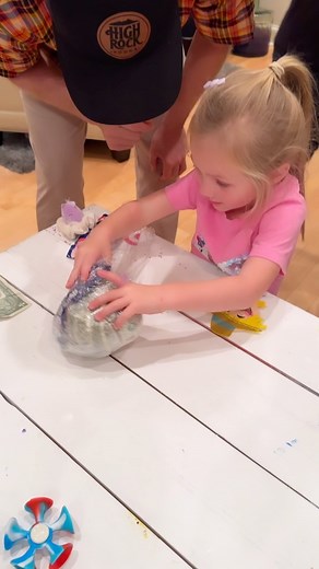 A M Y E A R N H A R D T on Instagram: "Plastic wrap ball kiddo style #earnhardts #thanksgiving #plasticwrapballgame #dollabills"