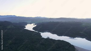 Tidal river delta estuary, wild Spanish coastal habitat, sunset AERIAL