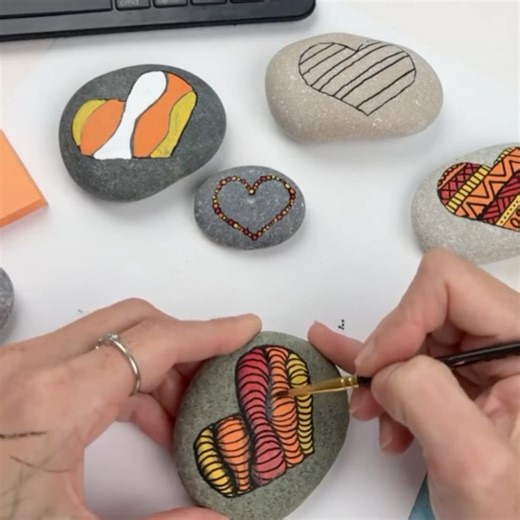 These look tricky, but once you see how they are painted you may want to give it a try!! We LOVE how these hearts turned out ❤💛🧡 If you need rock painting supplies just comment shop and we will send you our link. In this tutorial I used the dual-tip Tooli-Art paint pens for the colors and an extra fine tip Posca (1M) for the black. | Rock Painting 101