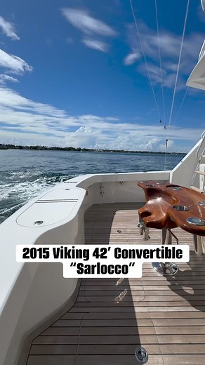 This 2015 Viking 42’ Convertible “Sarlocco” is powered with 600hp Cummins/Zeus pod drive diesel, she will cruise at 30 knots (low-to-mid 30s top speed depending on the load).This boat has many options you will not find on other boats like an air conditioned flybridge with twin Teak release helium seats and a bench seat forward of the helm so everyone can sit in the air conditioning on the ride out or back. | United Yacht Sales