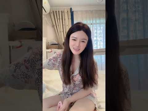 Young Wife in Pajamas Changing Bed Sheets 🛏️