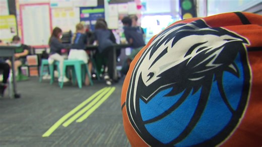 Second graders study math, with a Dallas Mavericks slant